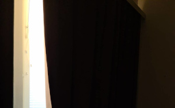 Window obscured by blackout curtains